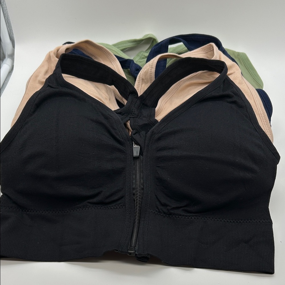 Source Unknown Black, nude, green and blue Sports Bra Set